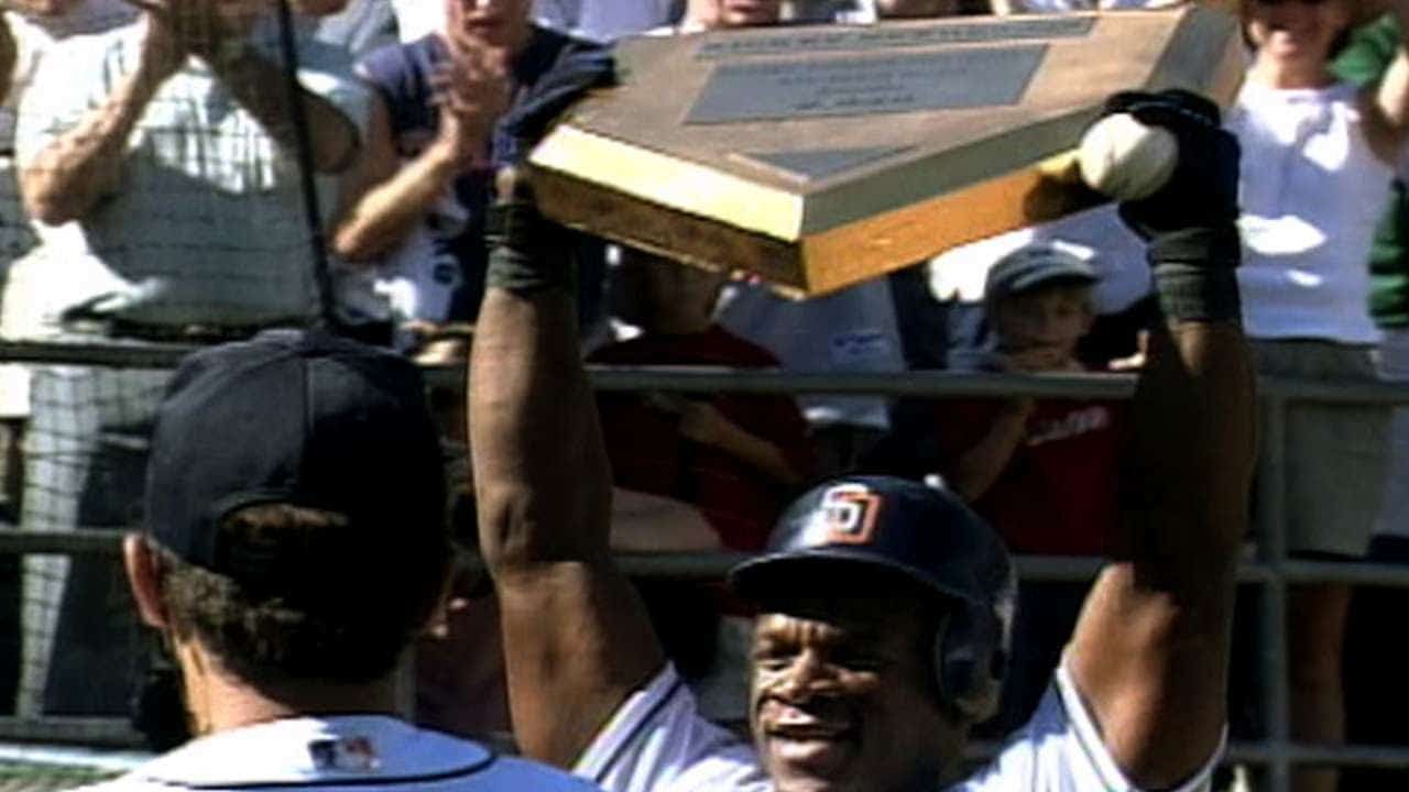 Oakland As Rickey Henderson holds third base over his head after breaking  Ty Cobbs career stole base record against the Toronto Blue Jays at the  Oakland Coliseum, Tuesday, May 29, 1990, Oakland
