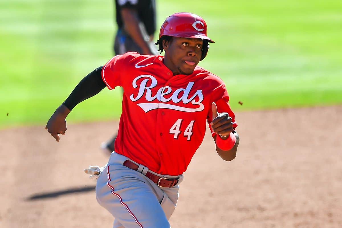 Reds designate Aquino for assignment